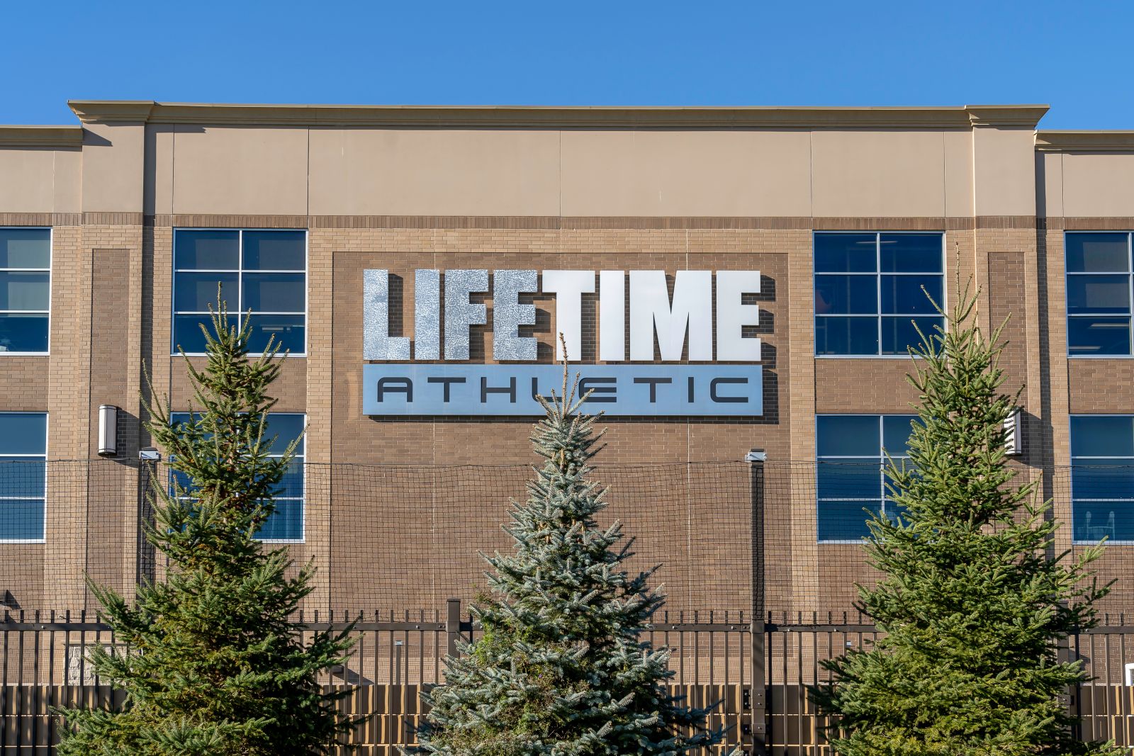 A front show of a Life Time gym by JHVEPhoto via Adobe Stock