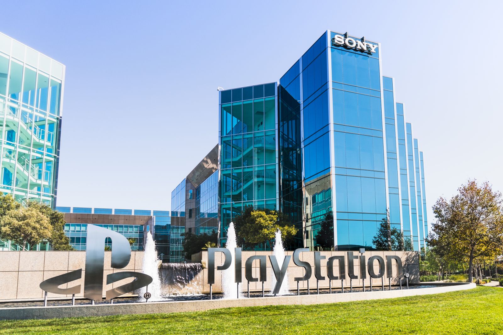 The front of a Sony office building with a PlayStation sign by Sundry Photography via Adobe Stock