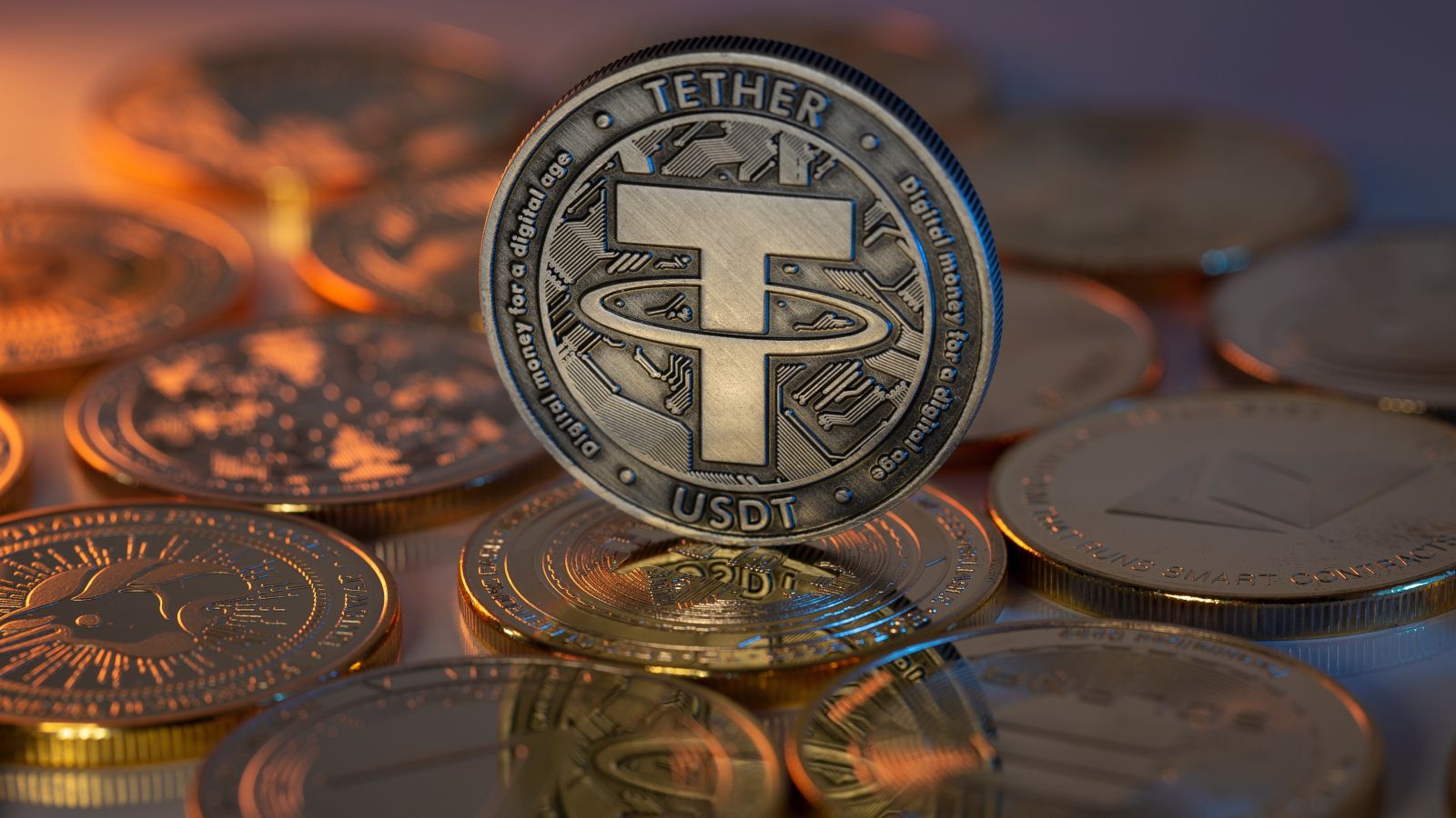 Crypto - Tether USDT Cryptocurrency Physical Coin - by Diamond Visuals via Shutterstock