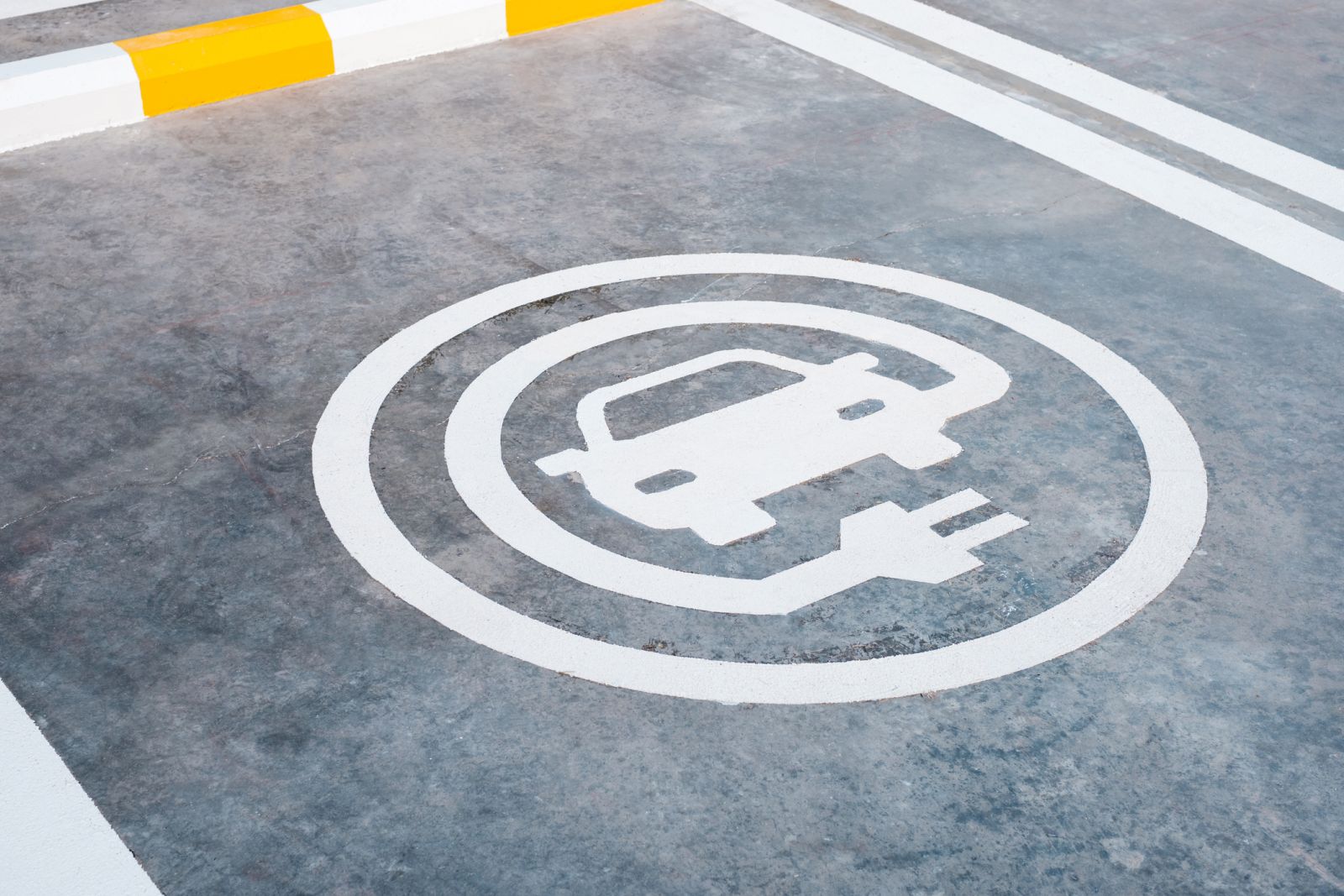 Green Energy (EV, solar, etc.) - EV charging spot by Patpitchaya via iStock