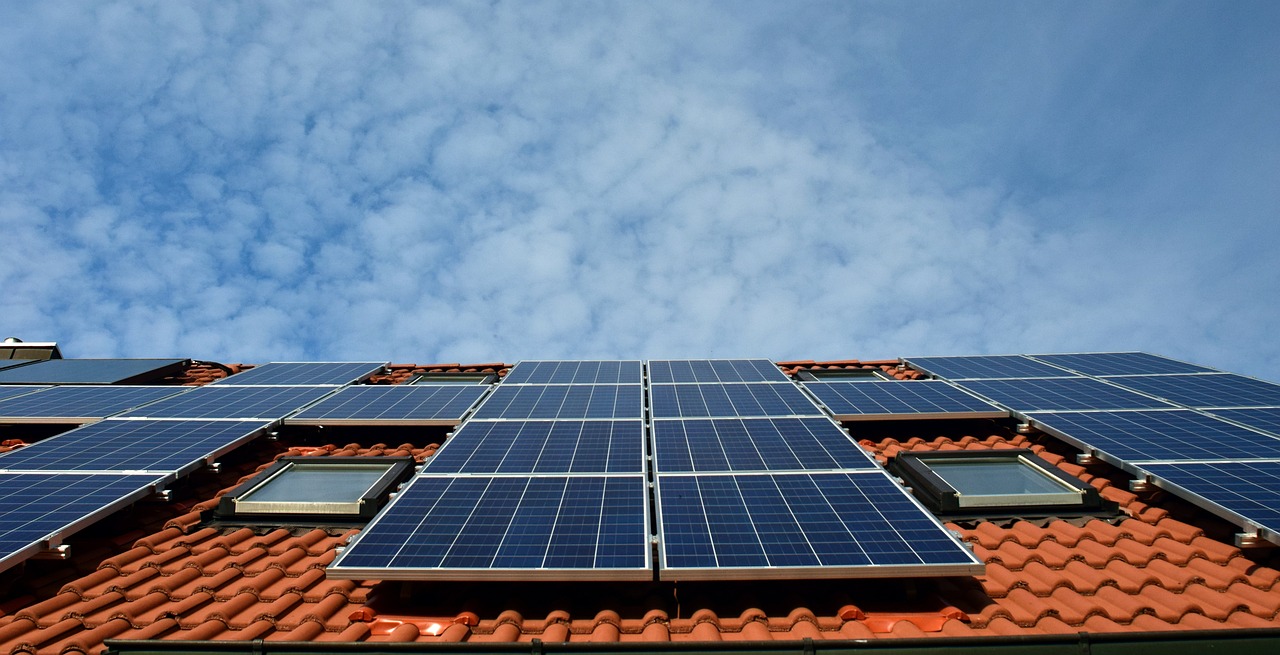 Green Energy (EV, solar, etc.) - Solar Panels on roof by Ulleo via Pixabay