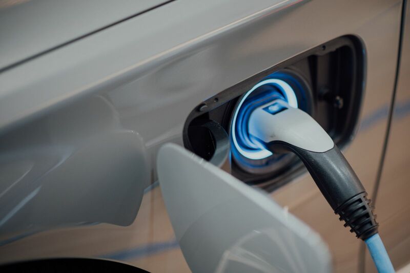 Green Energy (EV, solar, etc.) - closeup of electric car charging