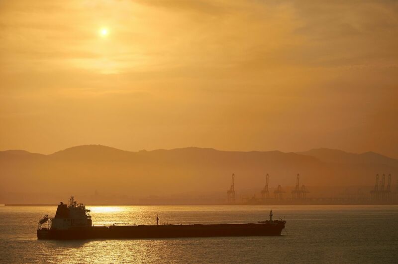 Oil - A sunset over a fuel tanker