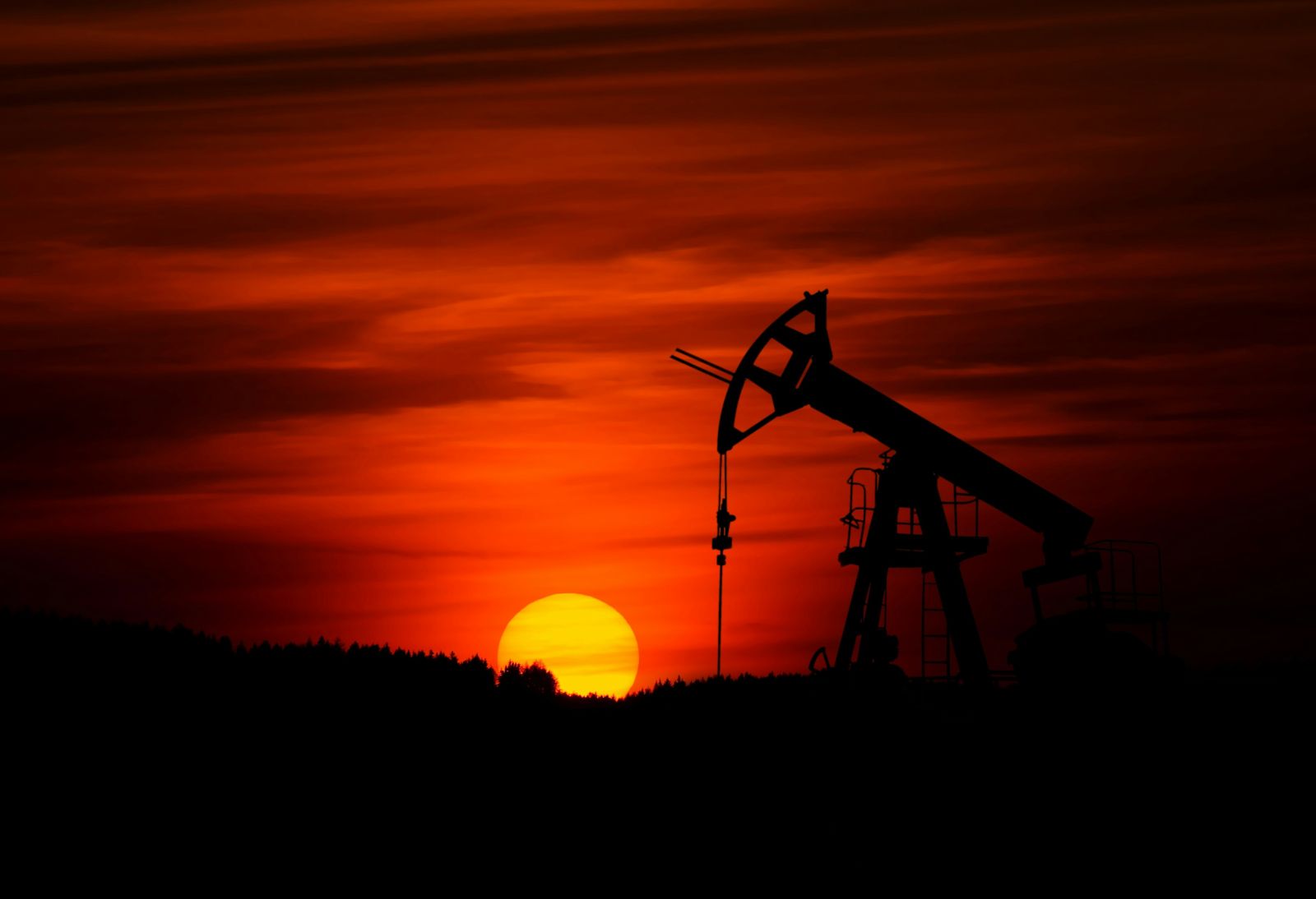 Oil - Crude Oil pumpjack at sunset by Zbynek Burival via Unsplash
