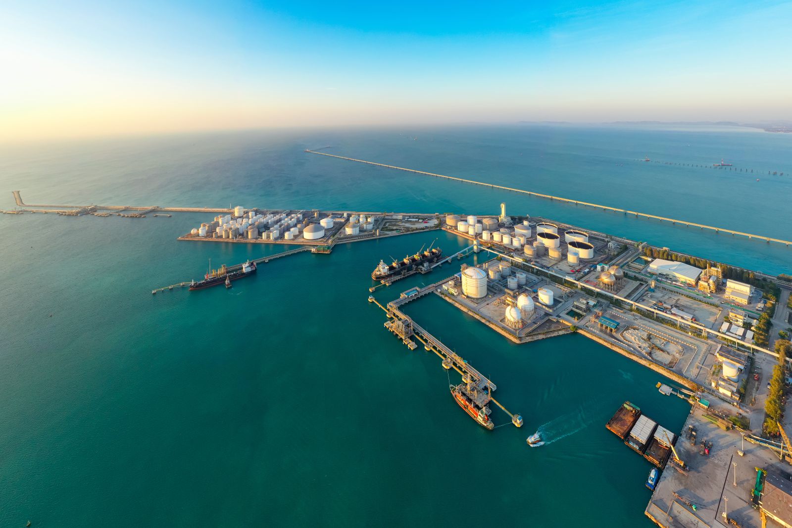 Crude oil unloading dock by Surapol Usanakul via Shutterstock