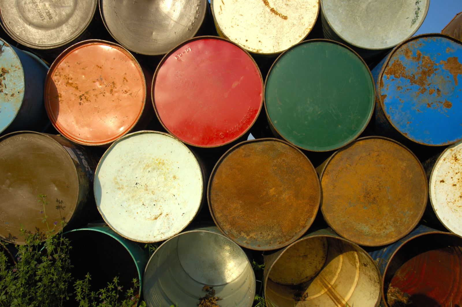 Oil barrels stacked on each other by Kalulu via iStock