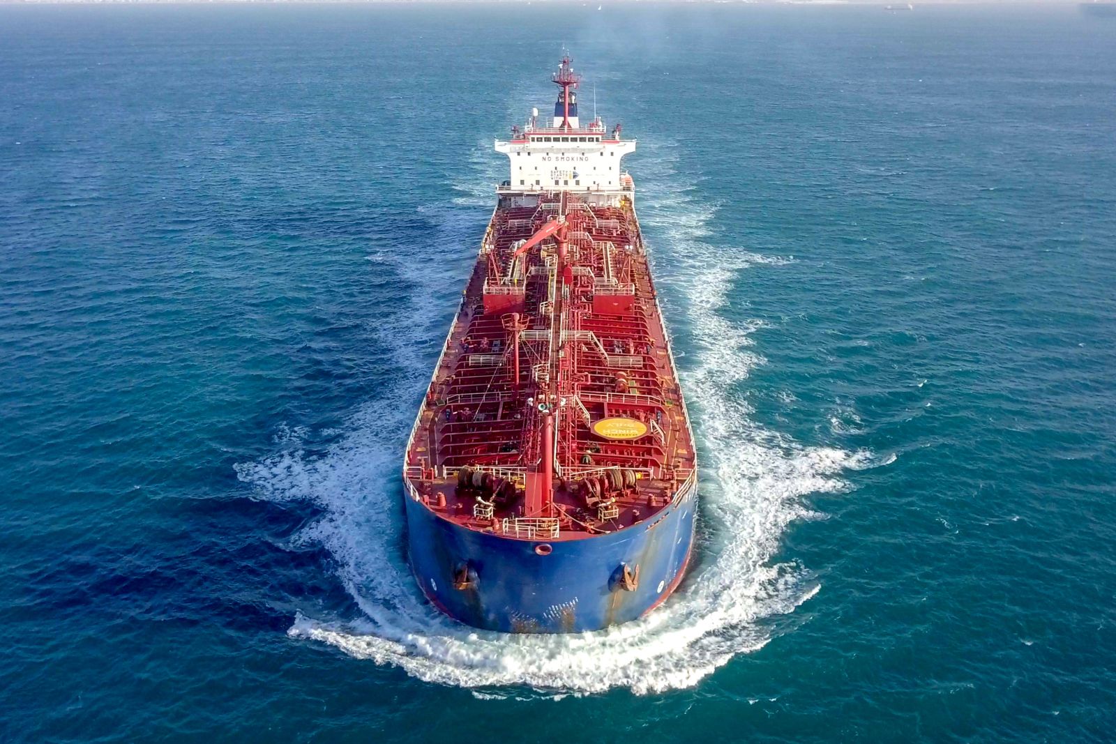 Oil - Oil tanker in open sea by StockStudio via Shutterstock