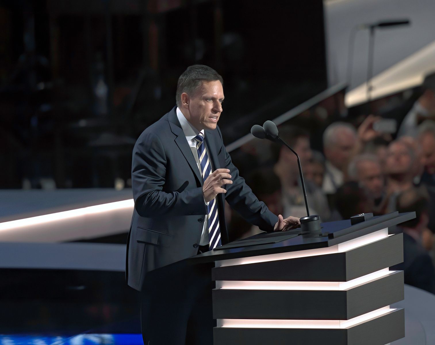 A shot of Peter Thiel speaking at a podium by mark reinstein via Shutterstock