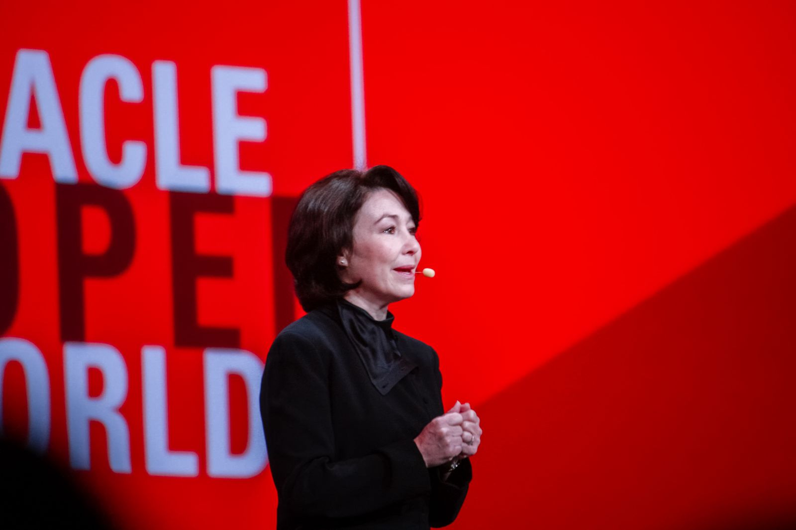 A side profile of Safra Catz speaking at an Oracle event by drserg via Shutterstock