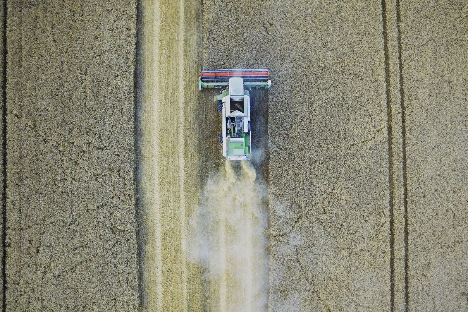 Farming - Farming with Combine by Michal Janek via Unsplash