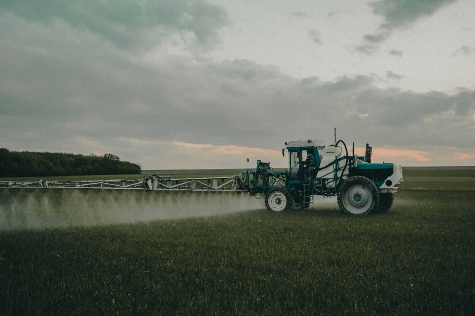 Spraying pestacides by Teo Sticea via Unsplash