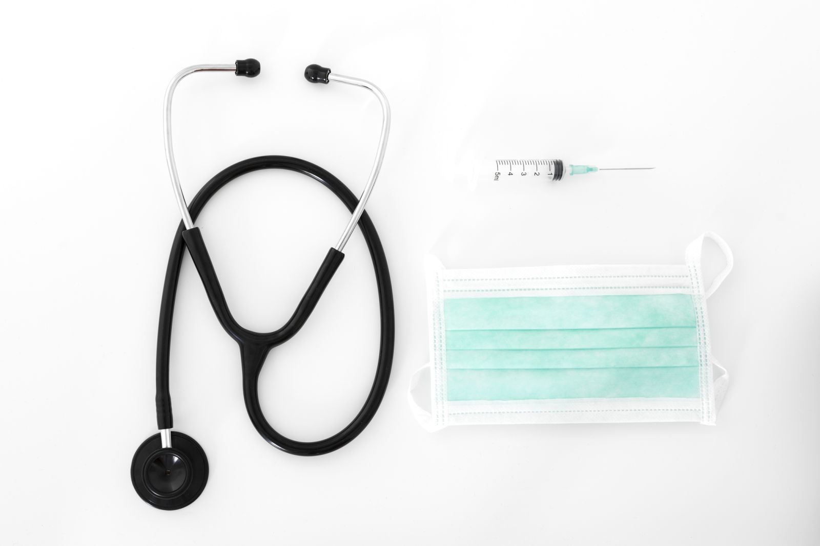 Healthcare - Stethoscope with injection and protective mask by frederic prochasson via iStock