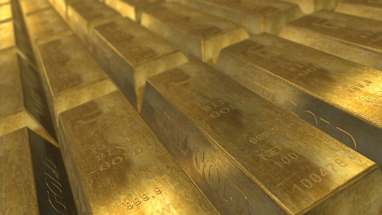 Metals - Gold bars in a neat row by PublicDomainPictures via Pixabay