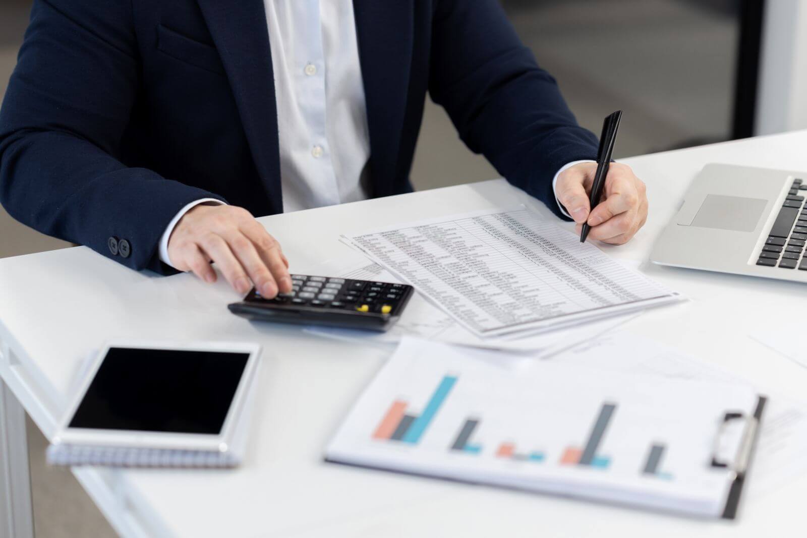 Investor evaluating company finances by voronaman via Shutterstock