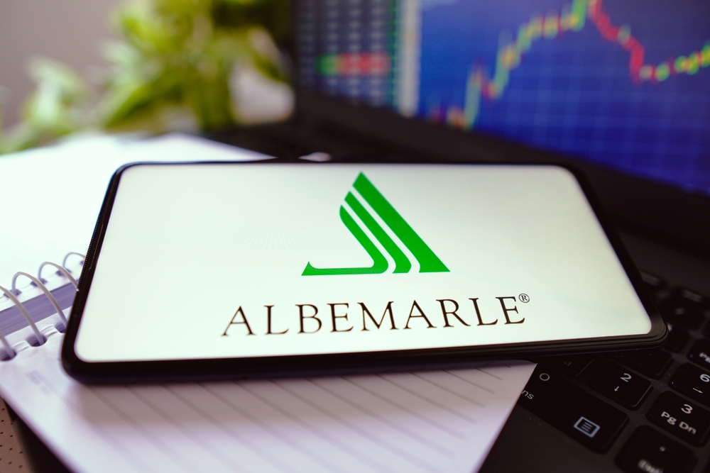 Basic Materials - Albemarle Corp phone on desk - by rafapress via Shutterstock