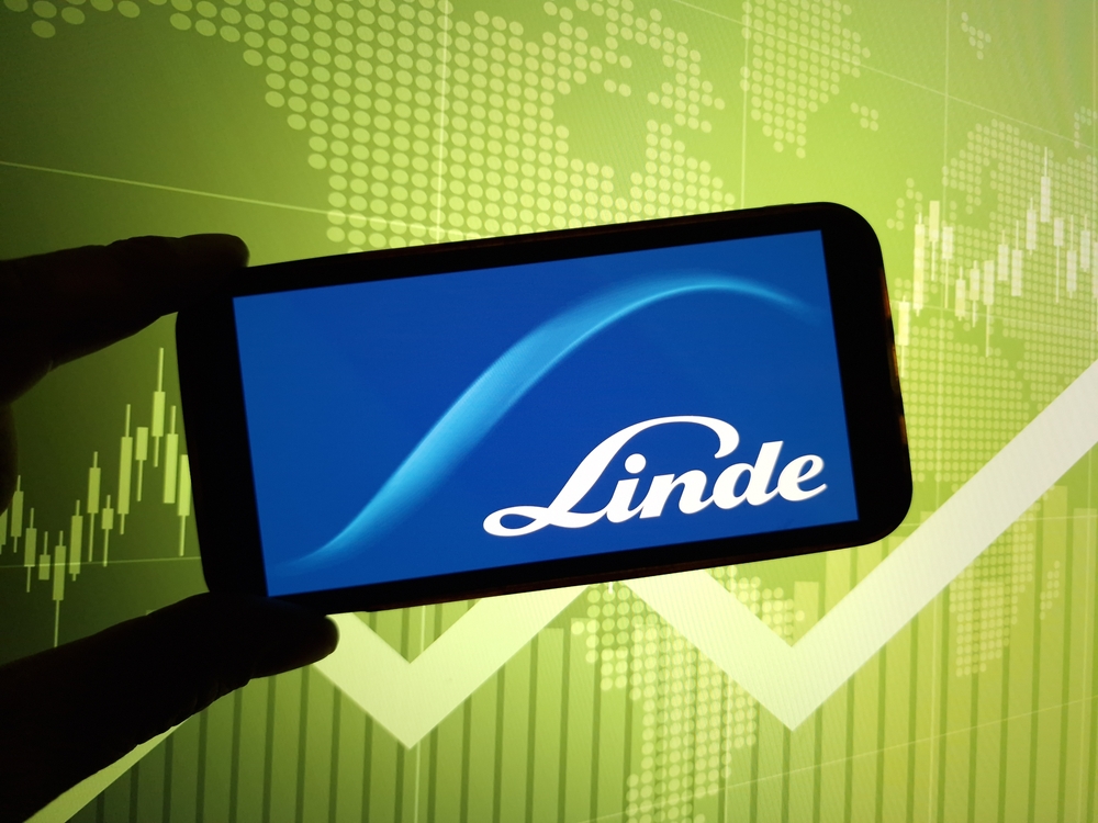 Basic Materials - Linde Plc_ phone and chart -by Piotr Swat via Shutterstock