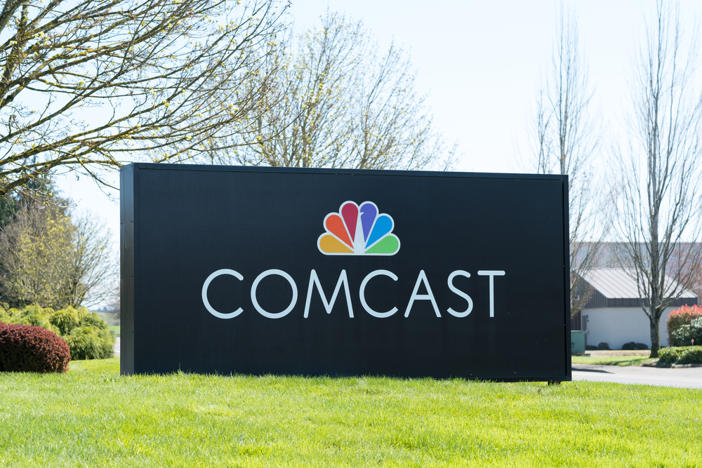 Communication Services - Comcast Corp outside sign by- Joshua Rainey Photography via Shutterstock