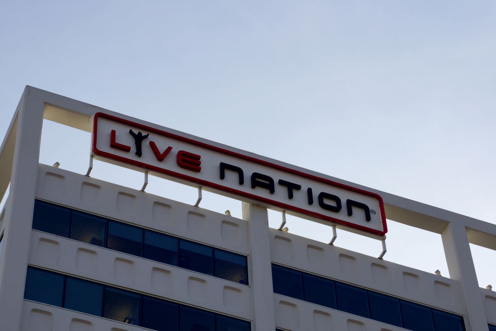 Communication Services - Live Nation Entertainment Inc building sign by-Eric Broder Van Dyke via iStock