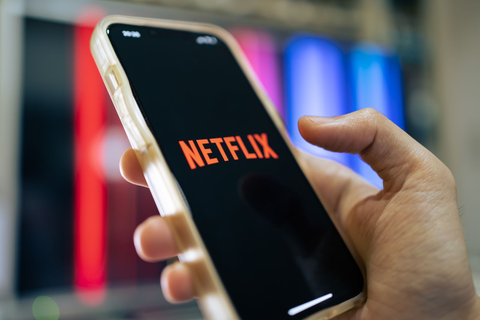 Communication Services - Netflix Inc_  on phone by- Wachiwit via iStock