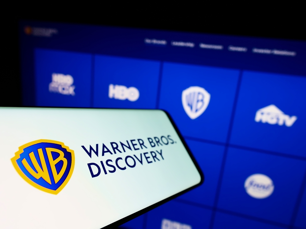 Communication Services - Warner Bros_ Discovery Inc  logo by- T_Schneider via Shutterstock