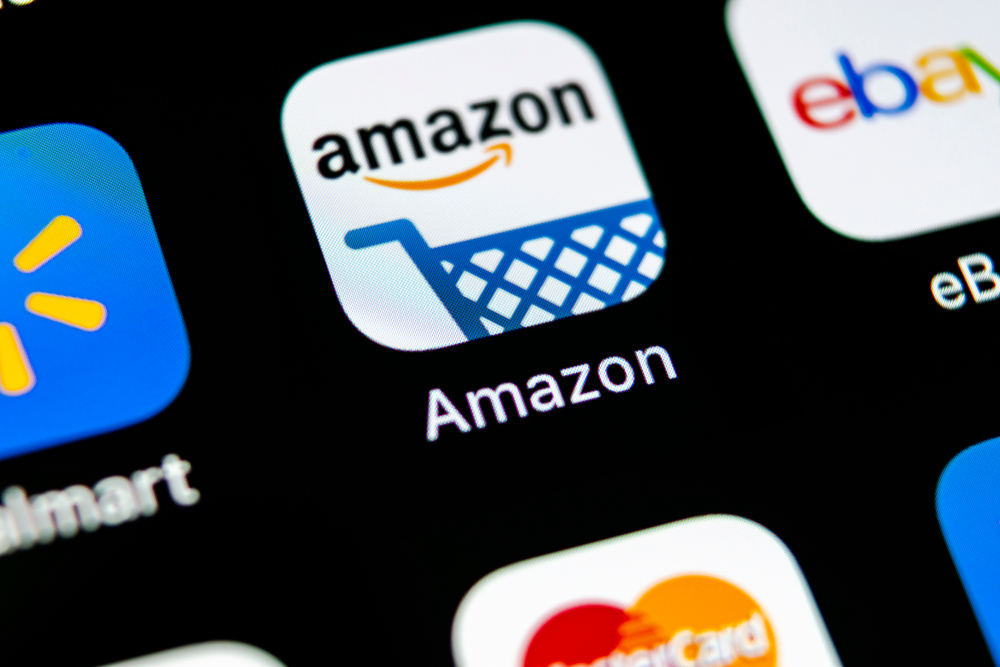 Consumer Cyclical (names A - H) - Amazon_com Inc_ phone app by- BigTunaOnline via Shutterstock