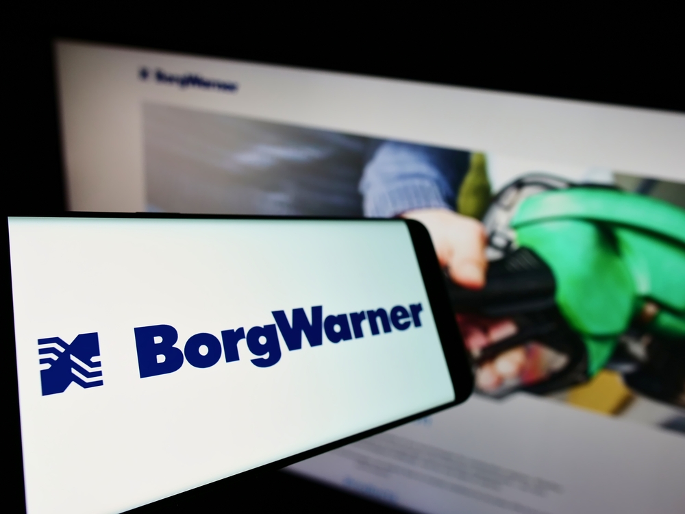 Consumer Cyclical (names A - H) - BorgWarner Inc phone and laptop by- T_Schneider via Shutterstock