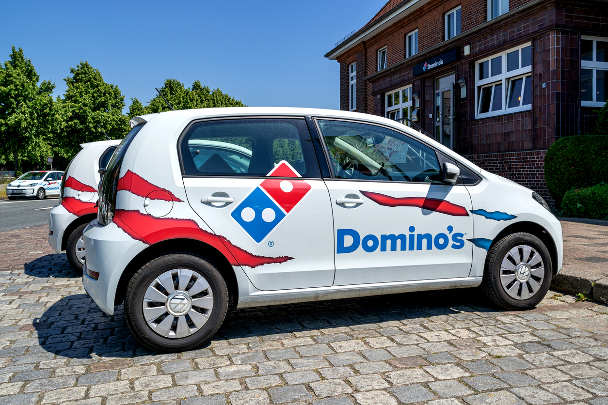 Dominos Pizza Inc delivery by- Bjoern Wylezich via iStock