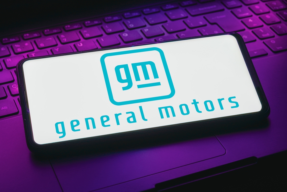 Consumer Cyclical (names A - H) - General Motors Company  phone on keyboard by- rafapress via Shutterstock
