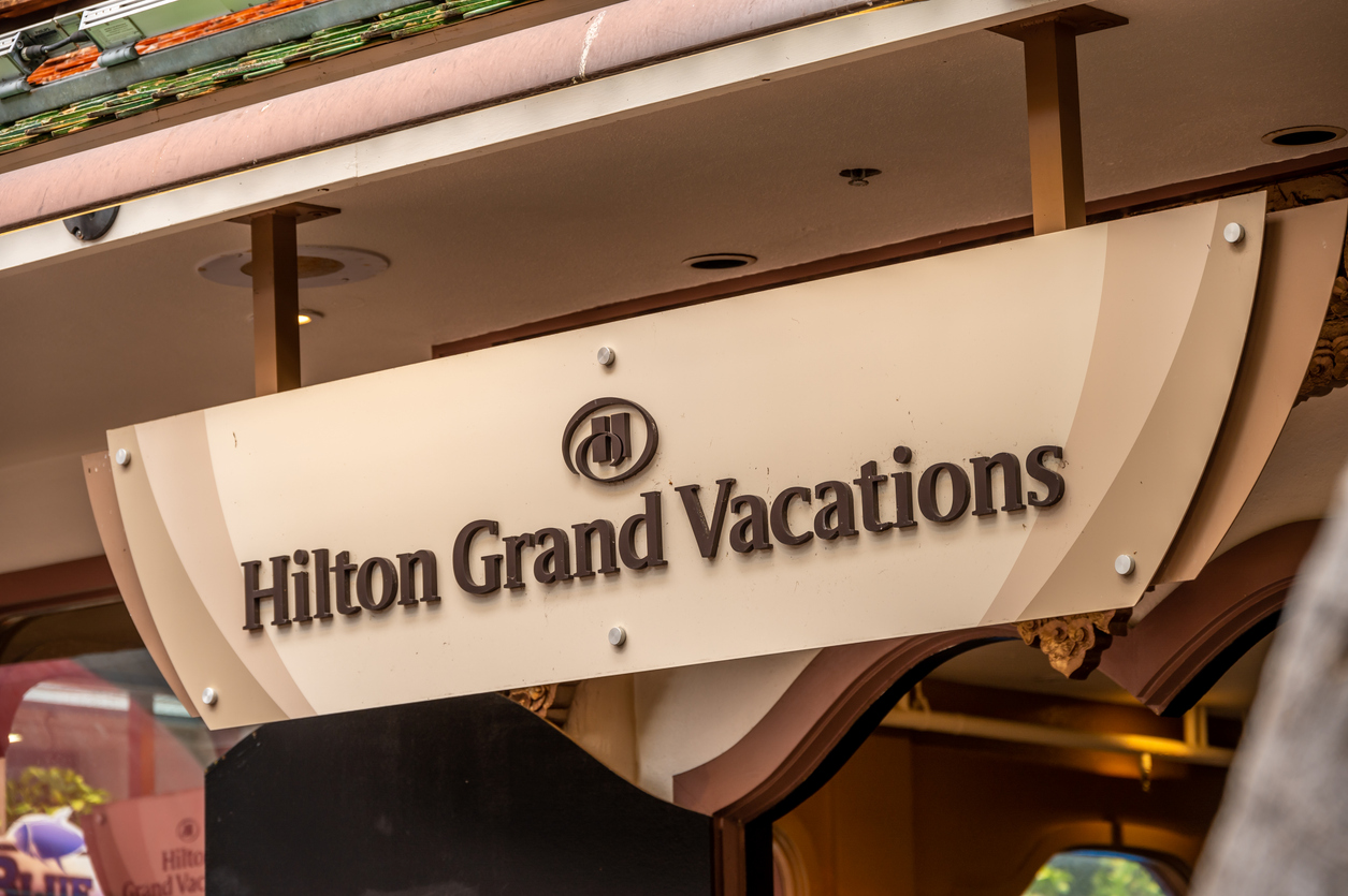 Consumer Cyclical (names A - H) - Hilton Worldwide Holdings Inc grand vacations sign by- jewhyte via iStock