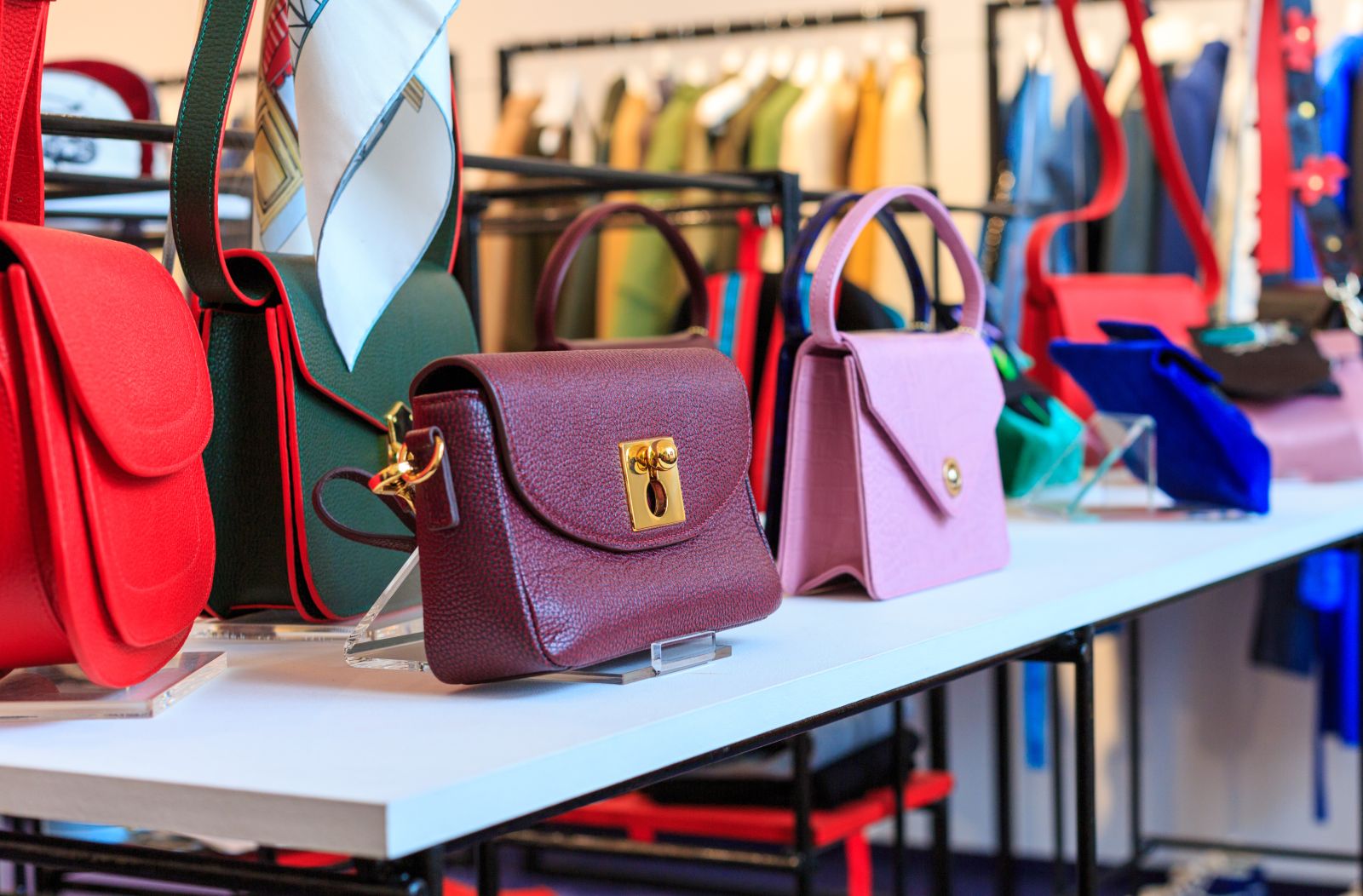 Handbags in shop window display by Georgii via Adobe Stock