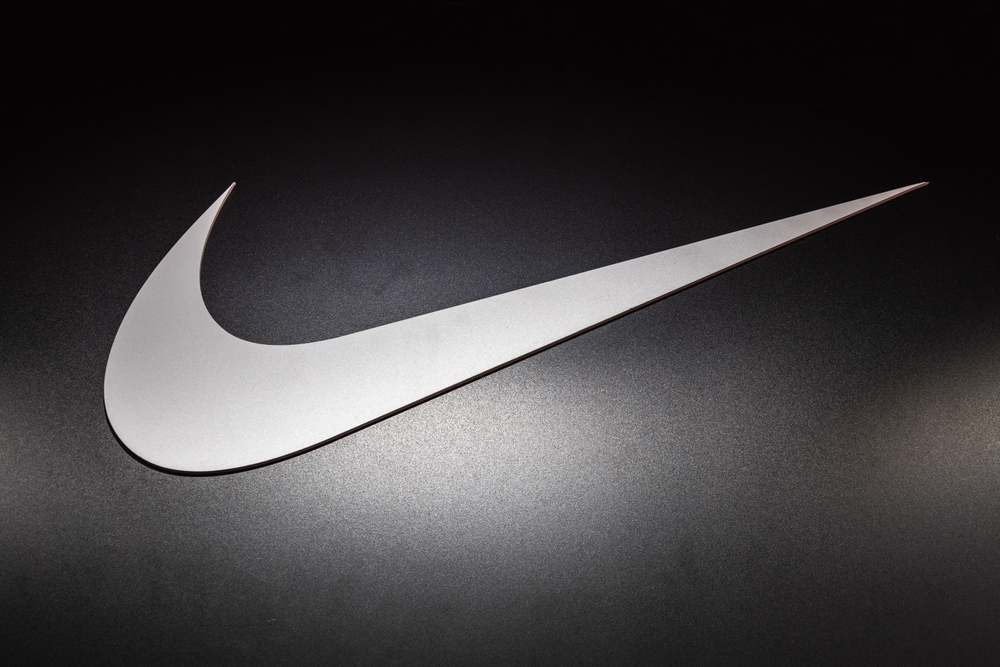 Consumer Cyclical (names I - Z) - Nike, Inc_ swish by- Tartezy via Shutterstock