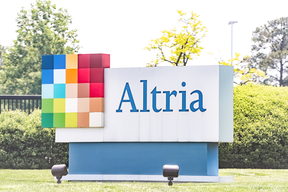 Consumer Defensive - Altria Group Inc_ logo on building- by Kristi Blokhin via Shutterstock