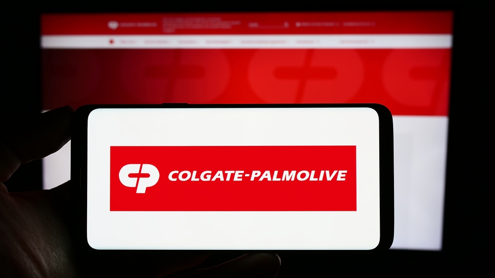 Consumer Defensive - Colgate-Palmolive Co_ logo on phone by- T_Schneider via Shutterstock