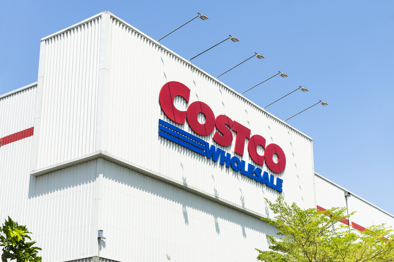 Consumer Defensive - Costco Wholesale Corp outside the warehouse by- Bing-Jhen Hong via iStock