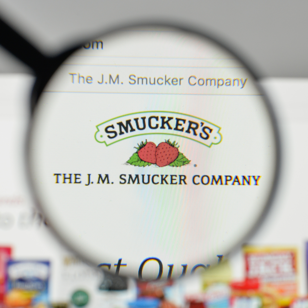 Consumer Defensive - J_M_ Smucker Co_ magnified logo -by Casimiro PT via Shutterstock