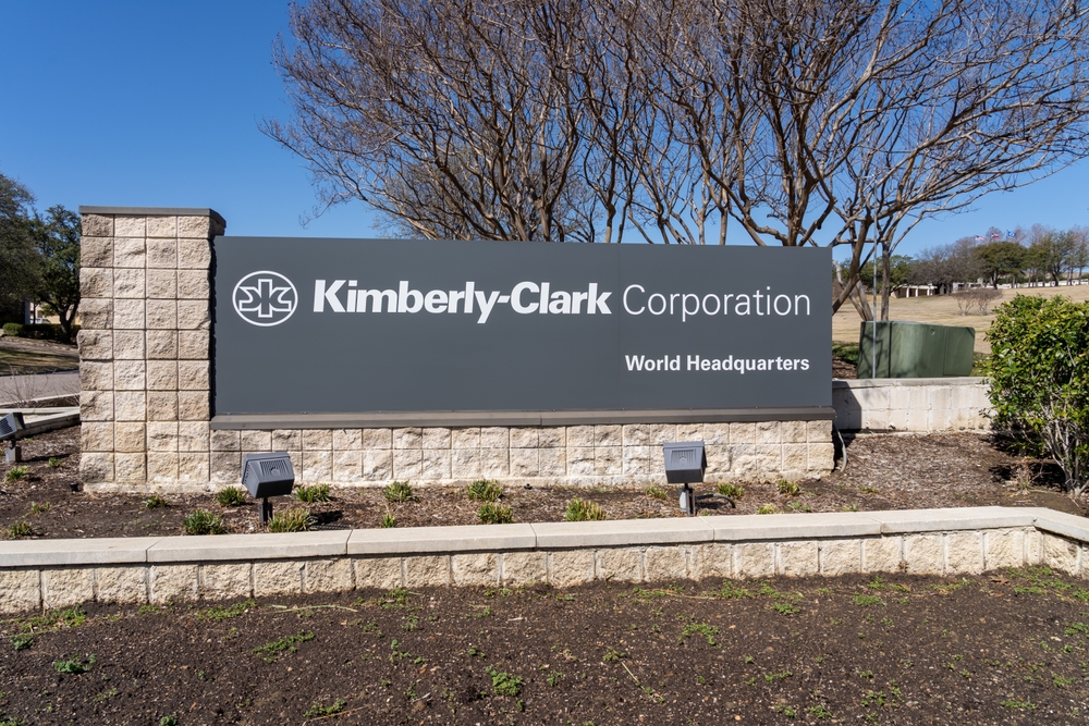 Consumer Defensive - Kimberly-Clark Corp_ address sign by- JHVEPhoto via Shutterstock