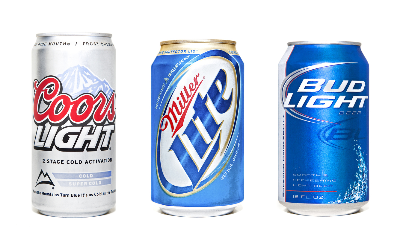 Consumer Defensive - Molson Coors Beverage Company beer cans -by D_Lentz via iStock