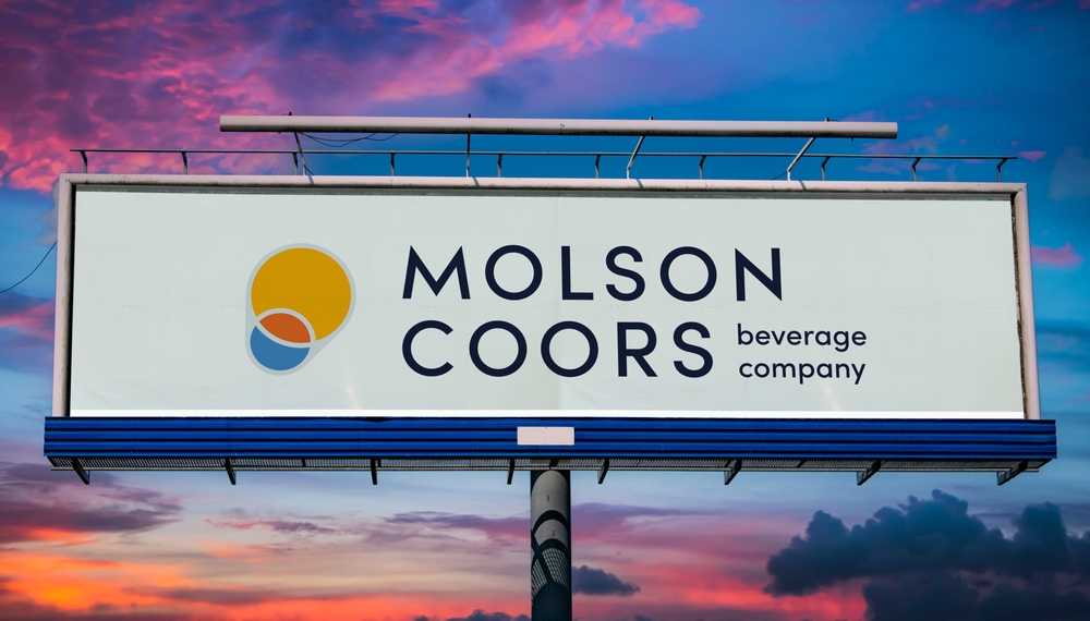 Consumer Defensive - Molson Coors Beverage Company billboard -by monticello via Shutterstock