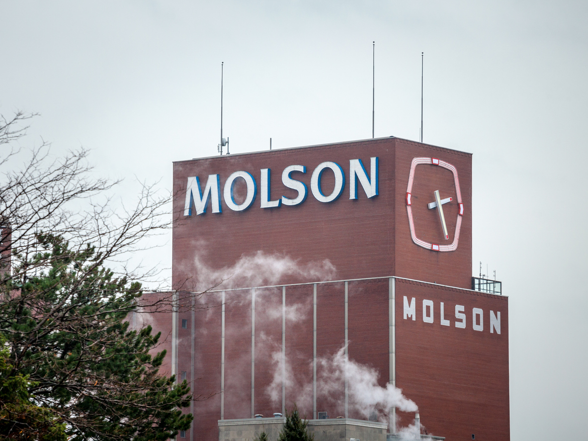 Consumer Defensive - Molson Coors Beverage Company building- by BalkansCat via iStock