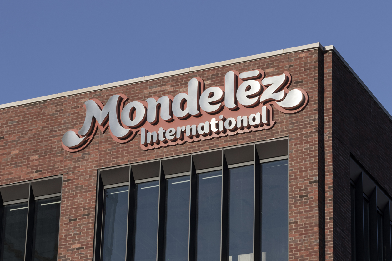 Consumer Defensive - Mondelez International Inc_ sign on building- by jetcityimage via iStock