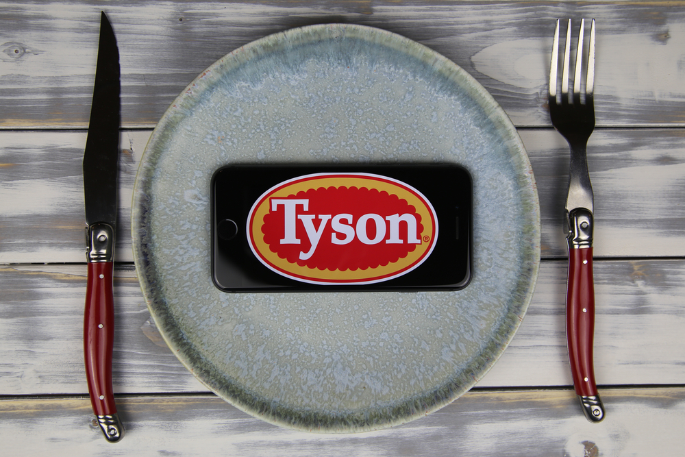 Consumer Defensive - Tyson Foods, Inc_ phone on plate- by Ralf Liebhold via Shutterstock
