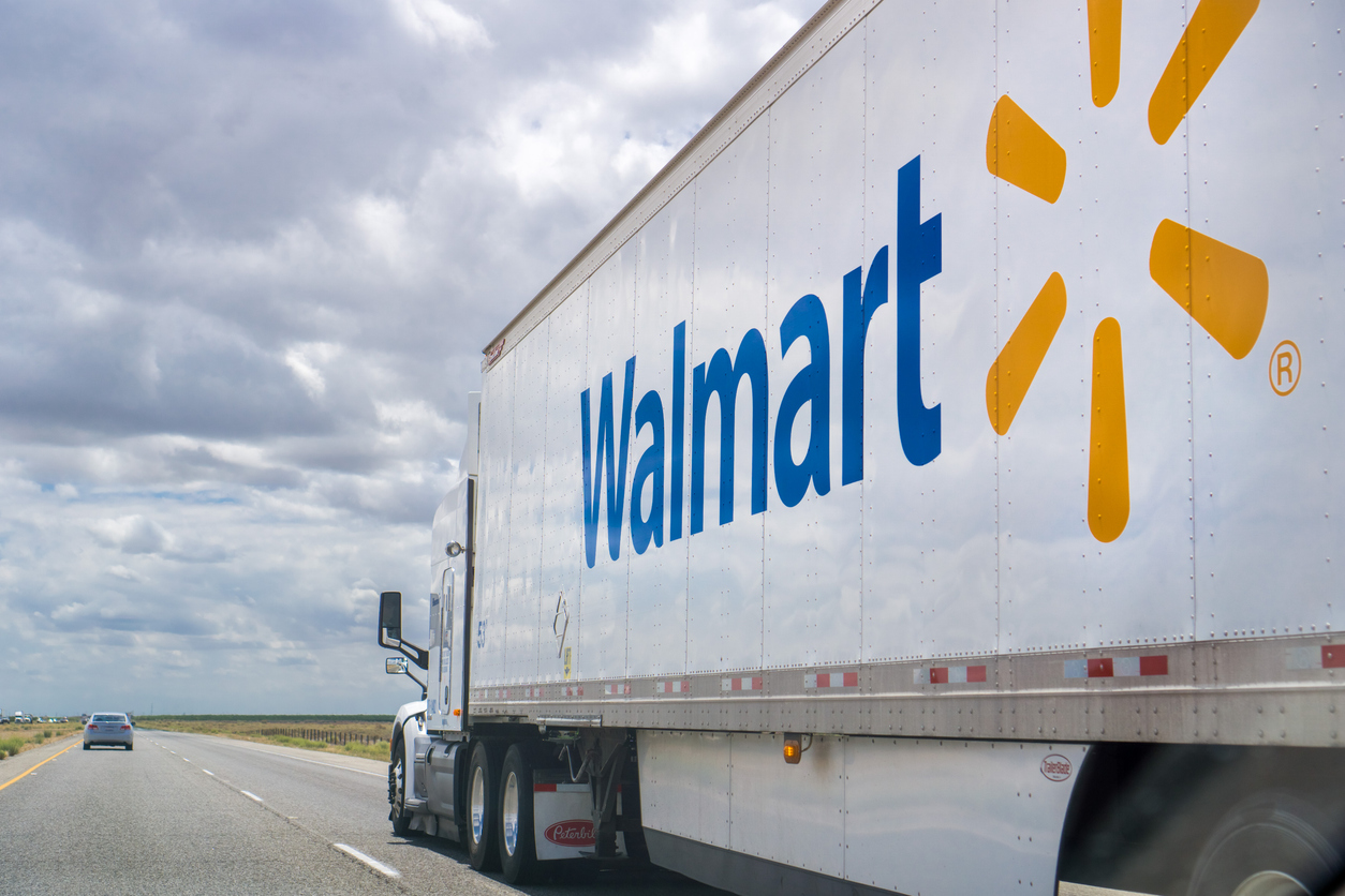 Consumer Defensive - Walmart Inc truck- by Sundry Photography via iStock