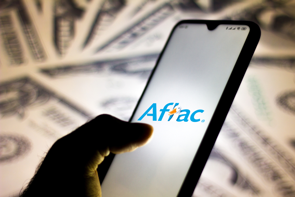 Financial (names A - I) - Aflac Inc_ logo on phone- by rafapress via Shutterstock