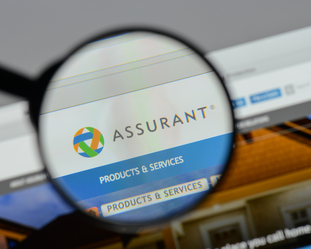 Financial (names A - I) - Assurant Inc magnified logo- by Casimiro PT via Shutterstock