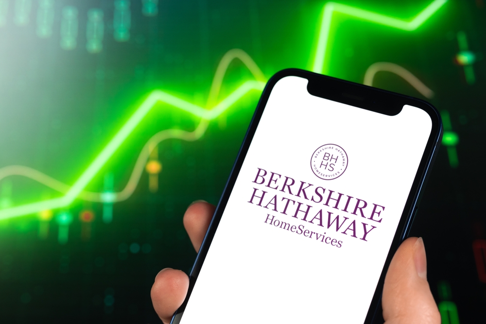 Financial (names A - I) - Berkshire Hathaway Inc_ logo on phone-by FelloeNeko via Shutterstock
