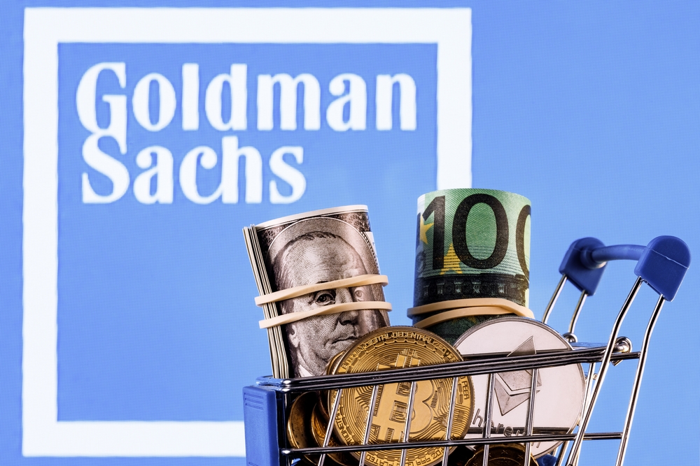 Financial (names A - I) - Goldman Sachs Group, Inc_ logo and cart full of money-by Sergi Elagin via Shutterstock