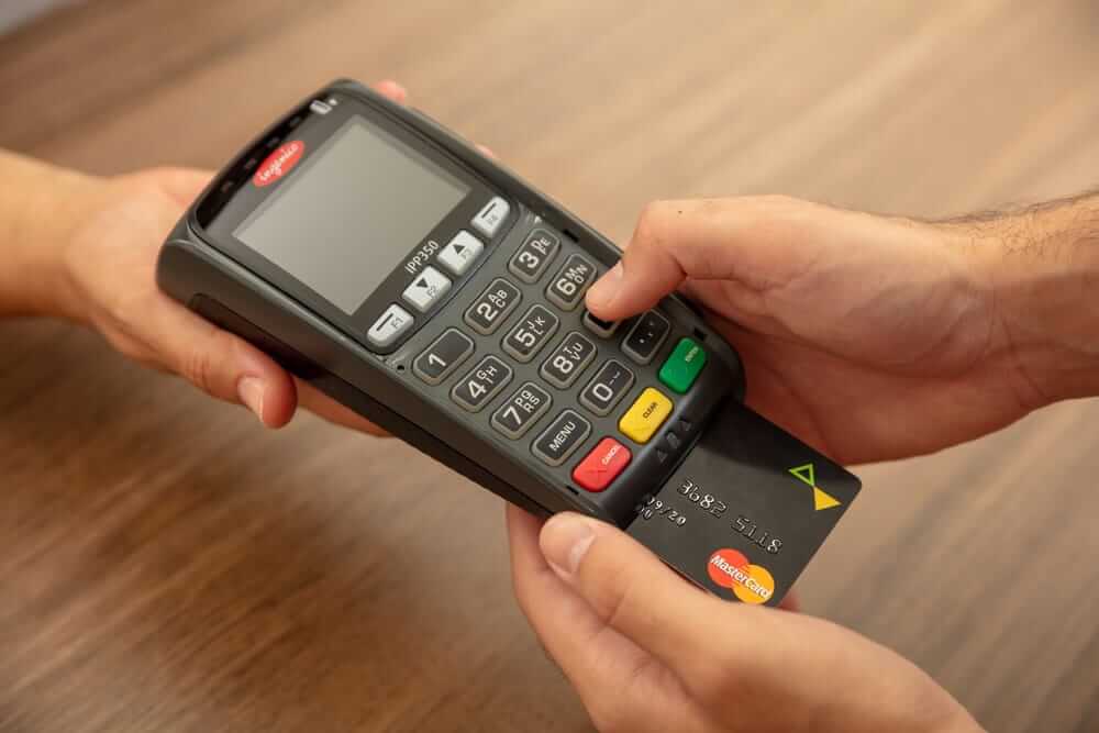 Mastercard Incorporated card being charged-by rawfb via Shutterstock