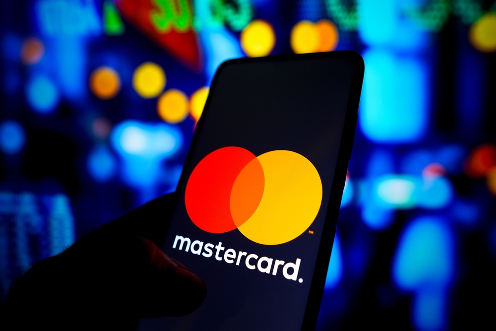 Financial (names J - Z) - Mastercard Incorporated logo on phone-by rafapress via Shutterstock