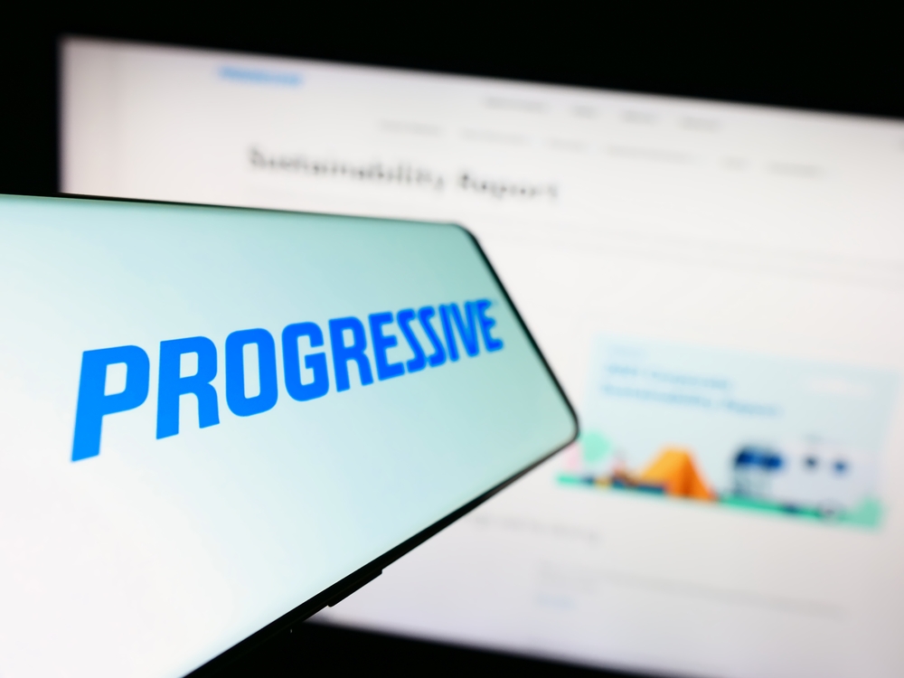 Progressive Corp_ logo on phone-by T_Schneider via Shutterstock