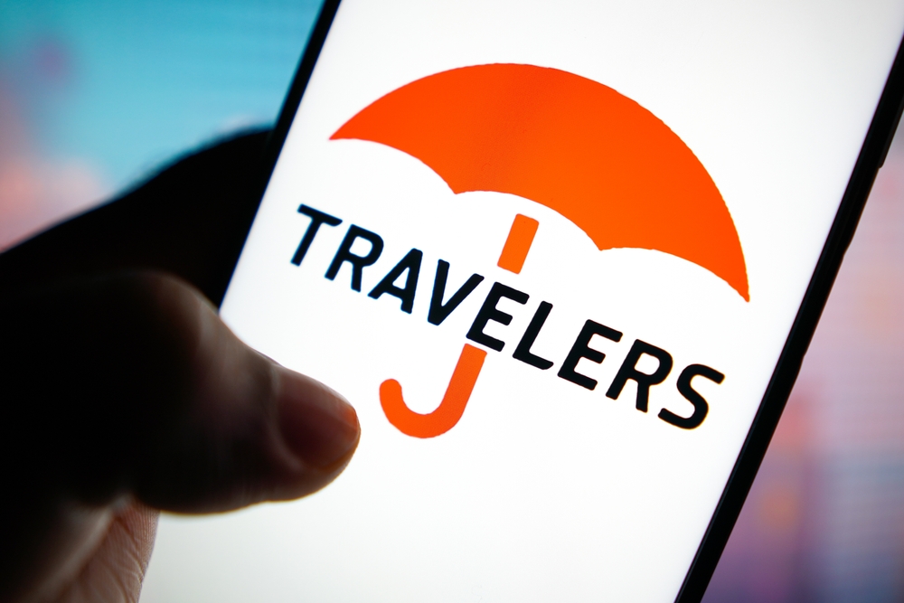 Financial (names J - Z) - Travelers Companies Inc_ logo on phone-by rafapress via Shutterstock